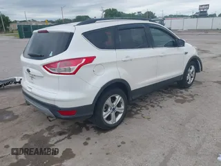 2014 Ford Escape SE with VIN 1FMCU9GX2EUA62133, listed as a IAAI auction lot 42342688 with Not provided miles and . Bid and sale history available at DreamBid. Image 4.