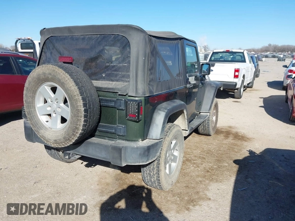 2007 Jeep Wrangler X with VIN 1J8FA24197L205095, listed as a IAAI auction lot 41388452 with 127,051 mi miles and . Bid and sale history available at carsss.com. Image 4.