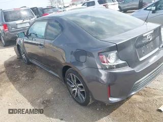2015 Scion tC z VIN JTKJF5C70FJ013710, wystawiony jako IAAI lot #41770647 z przebiegiem Nie podano mil oraz . Historia ofert i sprzedaży dostępna na DreamBid. Obrazek 3.