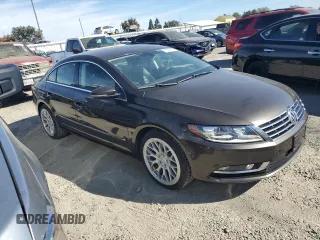 2014 Volkswagen CC R-Line with VIN WVWBP7AN4EE523426, listed as a Copart auction lot 75221154 with 139,876 mi miles and Clean Title. Bid and sale history available at DreamBid. Image 4.