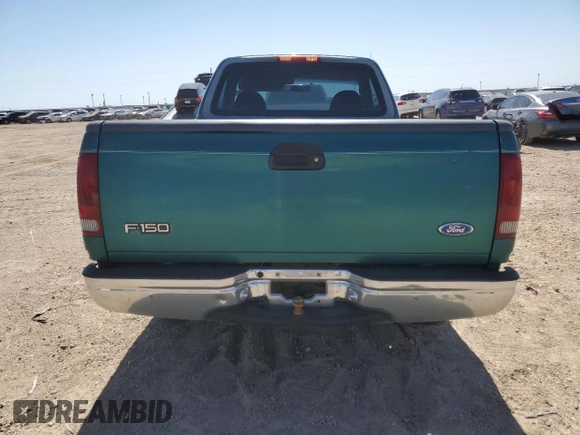 1997 Ford F-150 z VIN 1FTDF1728VNA87864, wystawiony jako Copart lot #74465184 z przebiegiem 205 501 mil mil oraz Szkoda całkowita • Salvage title. Historia ofert i sprzedaży dostępna na DreamBid. Obrazek 6.