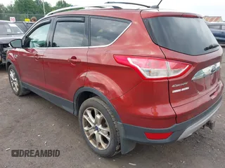 2015 Ford Escape Titanium z VIN 1FMCU9J98FUC84963, wystawiony jako IAAI lot #42469112 z przebiegiem 128 838 mil mil oraz . Historia ofert i sprzedaży dostępna na DreamBid. Obrazek 3.