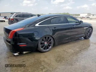 2014 Jaguar XJ Portfolio with VIN SAJWA2GZ2E8V64993, listed as a Copart auction lot 88774965 with 78,689 mi miles and Salvage title. Bid and sale history available at DreamBid. Image 3.
