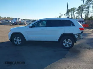 2017 Jeep Grand Cherokee Laredo with VIN 1C4RJFAG7HC688625, listed as a IAAI auction lot 41295860 with 115,714 mi miles. Bid and sale history available at carsss.com. Image 14.