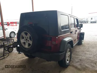2010 Jeep Wrangler Unlimited Rubicon z VIN 1J4HA6H18AL180628, wystawiony jako IAAI lot #42110357 z przebiegiem 217 940 mil mil oraz . Historia ofert i sprzedaży dostępna na DreamBid. Obrazek 4.