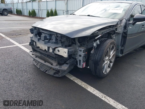 2014 Mazda 6 i Grand Touring with VIN JM1GJ1W63E1147380, listed as a IAAI auction lot 41928637 with 140,091 mi miles and . Bid and sale history available at DreamBid. Image 6.