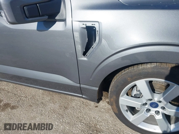 2022 Ford F-150 XL with VIN 1FTMF1E58NKE13712, listed as a IAAI auction lot 41360118 with 26,097 mi miles and . Bid and sale history available at DreamBid. Image 21.