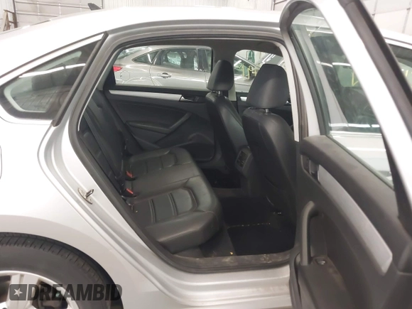2013 Volkswagen Passat SE with VIN 1VWBH7A39DC145297, listed as a IAAI auction lot 42048991 with 146,897 mi miles and . Bid and sale history available at DreamBid. Image 8.