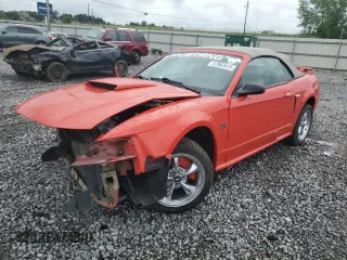 2001 Ford Mustang GT Deluxe z VIN 1FAFP45X01F203123, wystawiony jako Copart lot #57983415 z przebiegiem Nie podano mil oraz Szkoda całkowita • Salvage title. Historia ofert i sprzedaży dostępna na DreamBid. Obrazek 1.