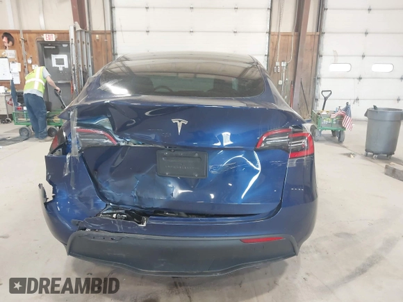 2021 Tesla Model Y Long Range with VIN 5YJYGDEE7MF066269, listed as a IAAI auction lot 42170970 with 70,170 mi miles. Bid and sale history available at carsss.com. Image 16.