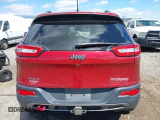 2015 Jeep Cherokee Trailhawk with VIN 1C4PJMBS0FW728361, listed as a IAAI auction lot 41978853 with 123,127 mi miles. Bid and sale history available at carsss.com. Image 16.