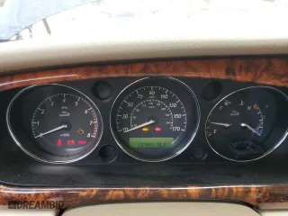 2004 Jaguar XJ with VIN SAJWA71C34SG19800, listed as a Copart auction lot 71877194 with 157,051 mi miles and Salvage Title. Bid and sale history available at carsss.com. Image 9.