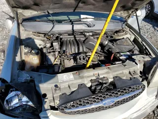 2003 Ford Taurus SE Standard with VIN 1FAFP53U53G225534, listed as a Copart auction lot 50206975 with 216,667 mi miles and Salvage Title. Bid and sale history available at DreamBid. Image 12.