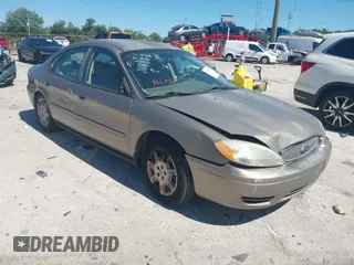 2006 Ford Taurus SE with VIN 1FAFP53U96A223924, listed as a IAAI auction lot 41828443 with 114,653 mi miles. Bid and sale history available at carsss.com. Image 1.