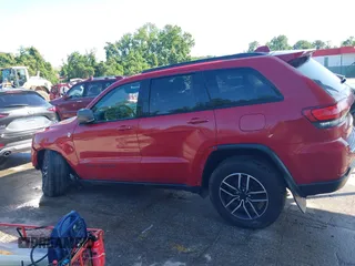 2021 Jeep Grand Cherokee Trailhawk with VIN 1C4RJFLG8MC549403, listed as a IAAI auction lot 42538177 with 33,124 mi miles and . Bid and sale history available at DreamBid. Image 14.