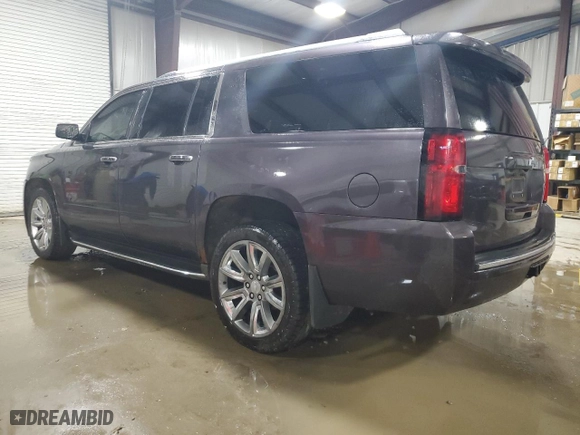 2015 Chevrolet Suburban LTZ with VIN 1GNSKKKC6FR689544, listed as a Copart auction lot 47524065 with 157,822 mi miles and Salvage Title. Bid and sale history available at carsss.com. Image 2.