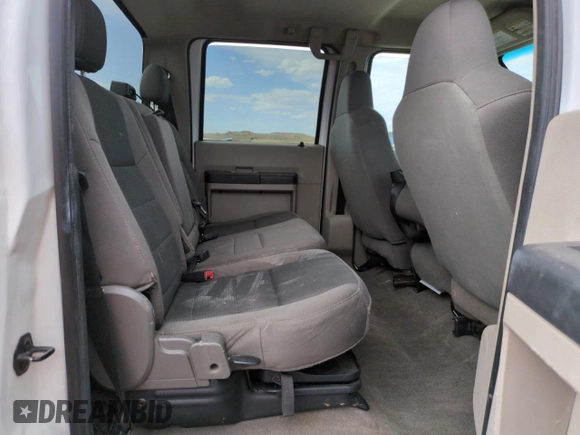 2010 Ford F-250 XL with VIN 1FTSW2B55AEA11379, listed as a Copart auction lot 62398055 with 155,397 mi miles and Salvage title. Bid and sale history available at DreamBid. Image 10.