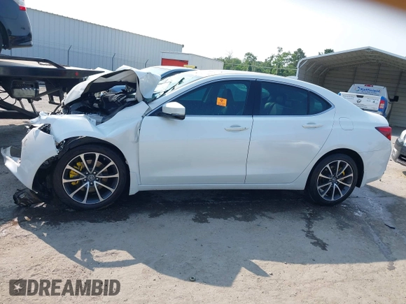 2015 Acura TLX V6 with VIN 19UUB2F35FA006406, listed as a IAAI auction lot 42409538 with Not provided miles and . Bid and sale history available at DreamBid. Image 13.