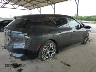 2022 BMW iX xDrive50 z VIN WB523CF02NCJ71343, wystawiony jako Copart lot #53404674 z przebiegiem 14 917 mil mil oraz Szkoda całkowita • Salvage title. Historia ofert i sprzedaży dostępna na DreamBid. Obrazek 3.