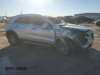 2020 Cadillac XT4 FWD Premium Luxury with VIN 1GYFZCR44LF099246, listed as a Copart auction lot 41861735 with 98,018 mi miles and Salvage title. Bid and sale history available at DreamBid. Image 4.