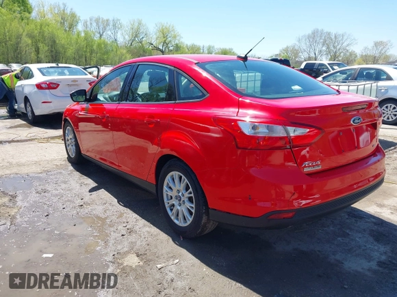 2012 Ford Focus SE z VIN 1FAHP3F23CL333598, wystawiony jako IAAI lot #41970172 z przebiegiem 209 969 mil mil oraz . Historia ofert i sprzedaży dostępna na DreamBid. Obrazek 3.