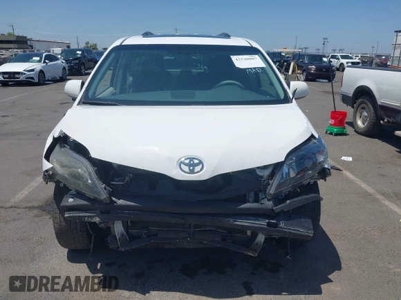 2014 Toyota Sienna SE z VIN 5TDXK3DC0ES515325, wystawiony jako IAAI lot #42520007 z przebiegiem 155 649 mil mil oraz . Historia ofert i sprzedaży dostępna na DreamBid. Obrazek 6.