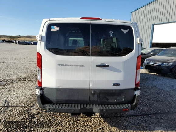 2017 Ford Transit z VIN 1FTYE1YM4HKA73728, wystawiony jako Copart lot #59231565 z przebiegiem 169 458 mil mil oraz Czysty tytuł • Clean title. Historia ofert i sprzedaży dostępna na DreamBid. Obrazek 8.