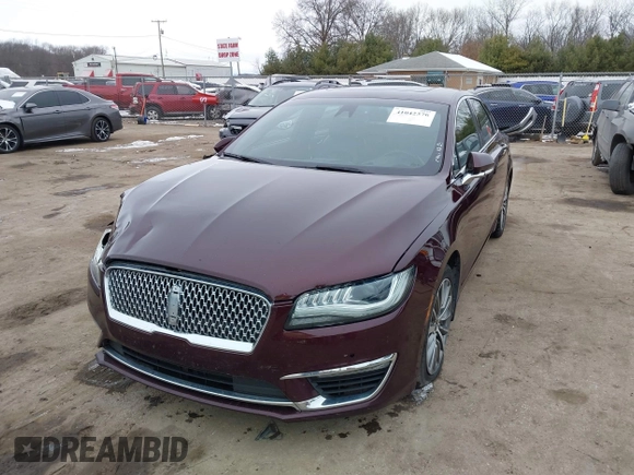 2017 Lincoln MKZ Select z VIN 3LN6L5CC3HR620854, wystawiony jako IAAI lot #41042376 z przebiegiem 131 517 mil mil oraz . Historia ofert i sprzedaży dostępna na DreamBid. Obrazek 2.