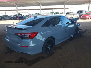 2022 Honda Civic Si with VIN 2HGFE1E58NH473302, listed as a IAAI auction lot 41473435 with 34,685 mi miles and . Bid and sale history available at DreamBid. Image 4.