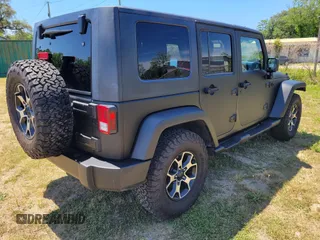 2014 Jeep Wrangler Unlimited Sport with VIN 1C4HJWDG4EL159619, listed as a IAAI auction lot 42176313 with 79,715 mi miles and . Bid and sale history available at DreamBid. Image 4.