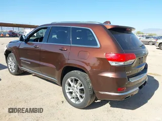 2015 Jeep Grand Cherokee Summit with VIN 1C4RJFJGXFC125131, listed as a IAAI auction lot 42475017 with 128,166 mi miles and . Bid and sale history available at DreamBid. Image 3.