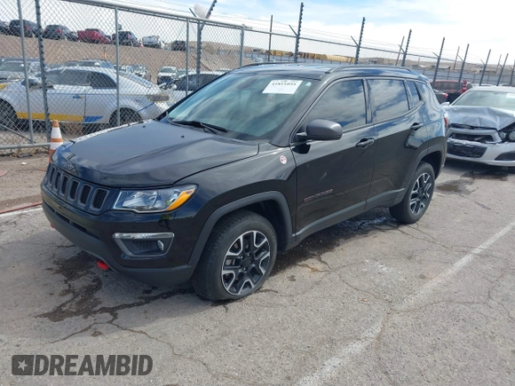 2020 Jeep Compass Trailhawk with VIN 3C4NJDDB7LT129673, listed as a IAAI auction lot 41811055 with 30,106 mi miles and . Bid and sale history available at carsss.com. Image 17.