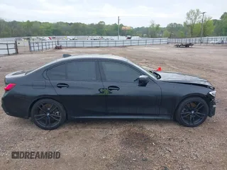 2019 BMW 3 Series 330i with VIN WBA5R1C51KAE82094, listed as a IAAI auction lot 39040815 with 66,344 mi miles and . Bid and sale history available at DreamBid. Image 14.