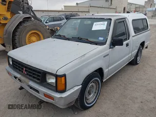 1990 Mitsubishi Mighty Max with VIN JA7FL24W6LP031144, listed as a IAAI auction lot 42152666 with 212,104 mi miles and . Bid and sale history available at DreamBid. Image 2.