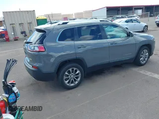 2021 Jeep Cherokee Latitude Lux with VIN 1C4PJLMX4MD158909, listed as a IAAI auction lot 41709423 with 28,368 mi miles. Bid and sale history available at carsss.com. Image 4.