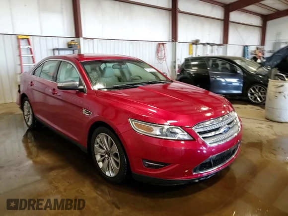 2012 Ford Taurus Limited z VIN 1FAHP2FW3CG142379, wystawiony jako Copart lot #55456245 z przebiegiem 145 311 mil mil oraz Szkoda całkowita • Salvage title. Historia ofert i sprzedaży dostępna na DreamBid. Obrazek 13.