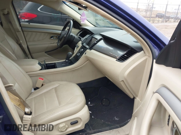 2014 Ford Taurus SEL with VIN 1FAHP2E80EG106719, listed as a IAAI auction lot 41967594 with 194,426 mi miles and . Bid and sale history available at DreamBid. Image 5.