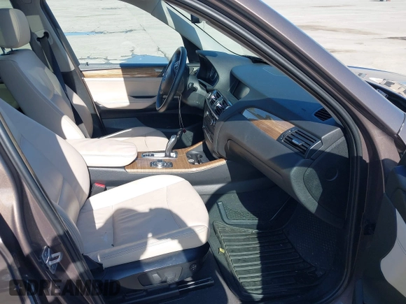 2012 BMW X3 28i with VIN 5UXWX5C53CL719786, listed as a IAAI auction lot 41857244 with 94,911 mi miles and . Bid and sale history available at DreamBid. Image 4.