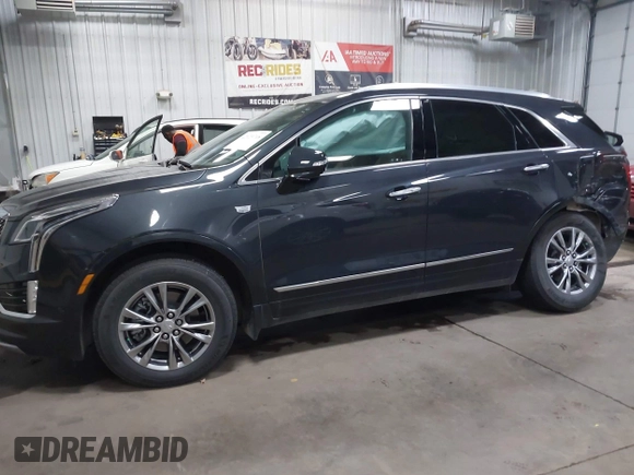 2023 Cadillac XT5 AWD Premium Luxury with VIN 1GYKNDRS2PZ122350, listed as a IAAI auction lot 42123718 with 17,971 mi miles and . Bid and sale history available at DreamBid. Image 14.