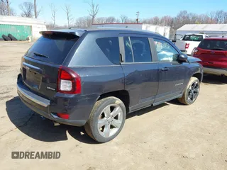 2014 Jeep Compass Limited with VIN 1C4NJDCB5ED700913, listed as a IAAI auction lot 41821956 with 175,312 mi miles. Bid and sale history available at carsss.com. Image 4.