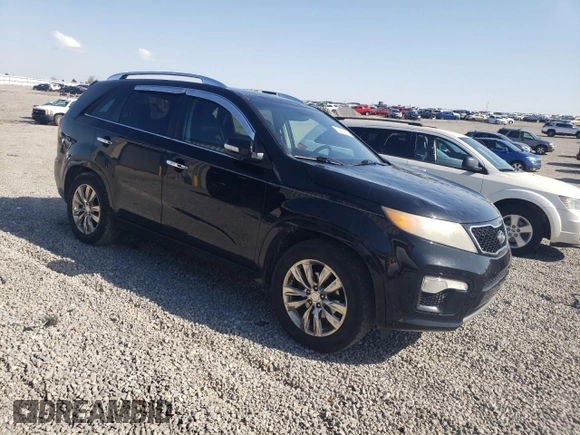 2012 Kia Sorento SX with VIN 5XYKW4A29CG247479, listed as a Copart auction lot 52226635 with 203,183 mi miles and Salvage Title. Bid and sale history available at carsss.com. Image 4.