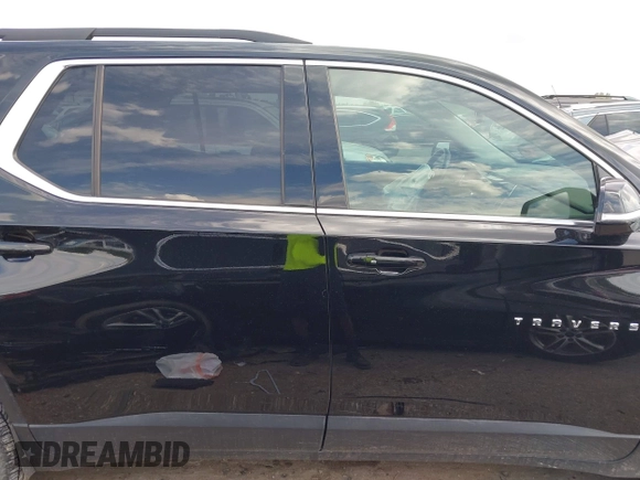 2020 Chevrolet Traverse LT Cloth with VIN 1GNERGKW7LJ199477, listed as a IAAI auction lot 42217904 with 21,269 mi miles and . Bid and sale history available at DreamBid. Image 13.