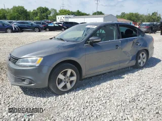 2012 Volkswagen Jetta TDI w/Premium & Nav z VIN 3VWLL7AJ2CM358901, wystawiony jako Copart lot #57350505 z przebiegiem 155 062 mil mil oraz Szkoda całkowita • Salvage title. Historia ofert i sprzedaży dostępna na DreamBid. Obrazek 1.