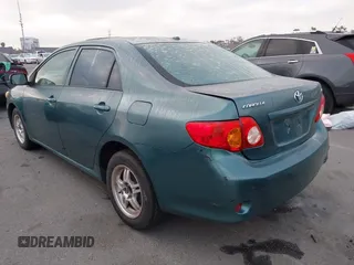 2009 Toyota Corolla with VIN 1NXBU40E39Z047881, listed as a IAAI auction lot 42078719 with 204,258 mi miles. Bid and sale history available at carsss.com. Image 3.