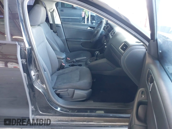 2014 Volkswagen Jetta S z VIN 3VW2K7AJ1EM311148, wystawiony jako IAAI lot #40418942 z przebiegiem 192 015 mil mil oraz . Historia ofert i sprzedaży dostępna na DreamBid. Obrazek 5.