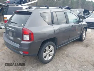 2016 Jeep Compass Latitude with VIN 1C4NJDEB4GD687300, listed as a IAAI auction lot 41800186 with 169,374 mi miles. Bid and sale history available at carsss.com. Image 4.