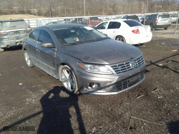 2013 Volkswagen CC Sport with VIN WVWBN7AN1DE563404, listed as a IAAI auction lot 41659845 with 171,631 mi miles. Bid and sale history available at carsss.com. Image 1.