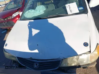 2002 Honda Odyssey EX z VIN 2HKRL18602H522128, wystawiony jako IAAI lot #40879648 z przebiegiem Nie podano mil oraz . Historia ofert i sprzedaży dostępna na DreamBid. Obrazek 10.