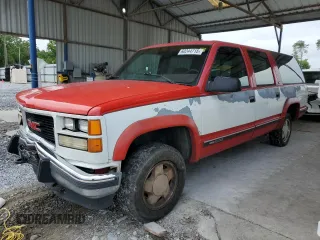 1994 GMC Suburban with VIN 1GKFK16KXRJ712627, listed as a Copart auction lot 60244715 with 326,548 mi miles and Salvage title. Bid and sale history available at DreamBid. Image 1.