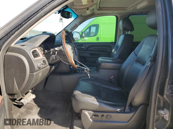 2012 GMC Yukon XL Denali with VIN 1GKS1MEFXCR300868, listed as a Copart auction lot 48139195 with 221,274 mi miles and Salvage Title. Bid and sale history available at carsss.com. Image 7.